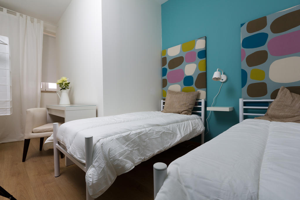 Turismo Do Seculo Hotell Estoril Rom bilde A bedroom at the hotel