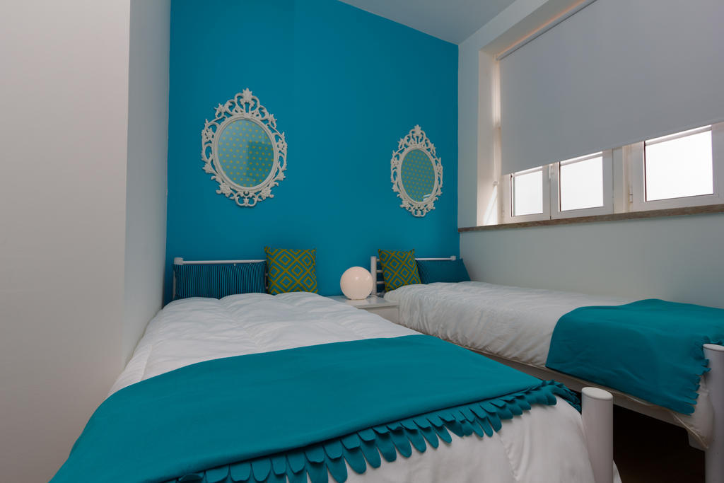 Turismo Do Seculo Hotell Estoril Rom bilde A bedroom at the hotel