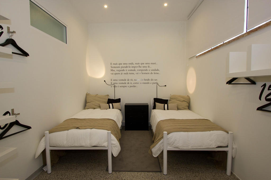 Turismo Do Seculo Hotell Estoril Rom bilde A bedroom in the hotel